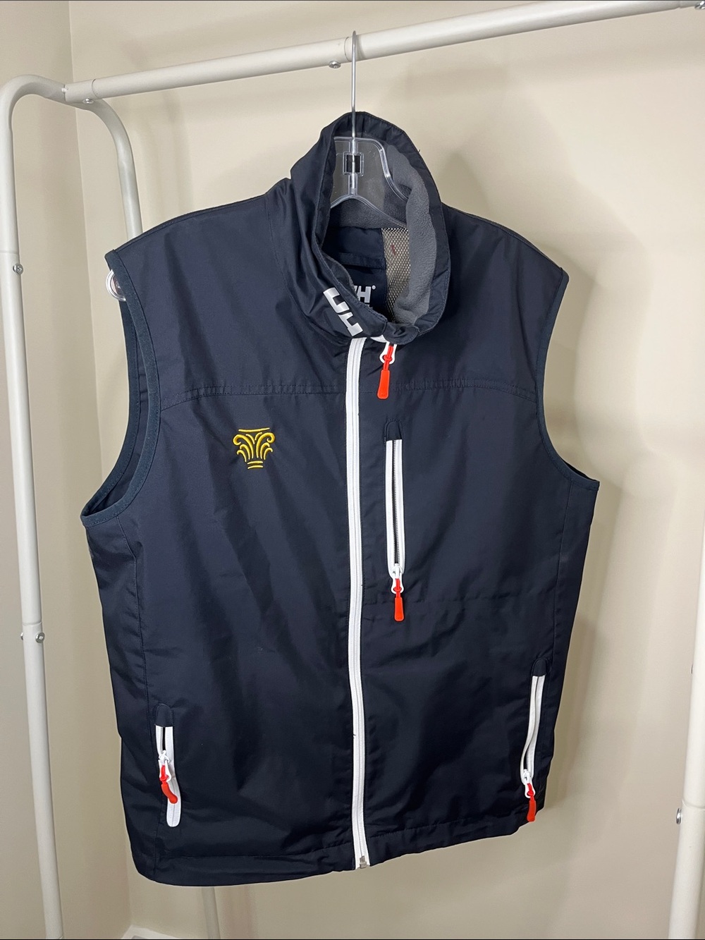 Helly Hansen Navy Vest with White Zippers and Orange Pulls